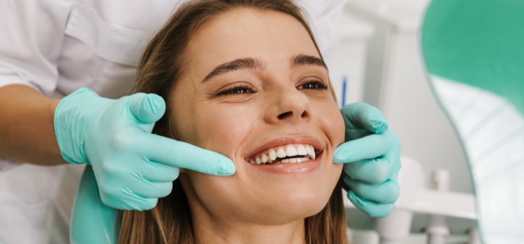 Female dental patient smiling.