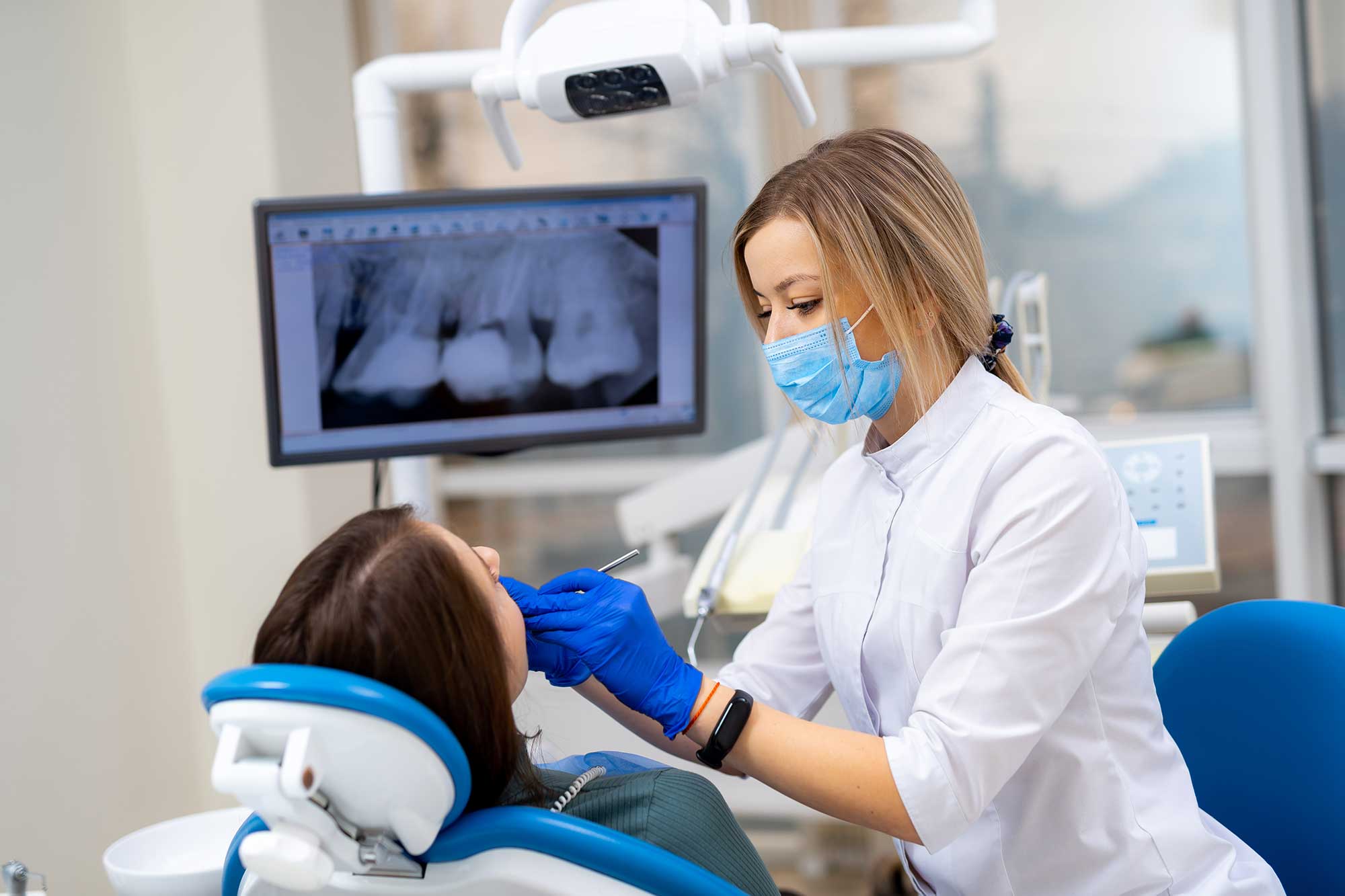 Patient in a dentist’s office getting a treatment