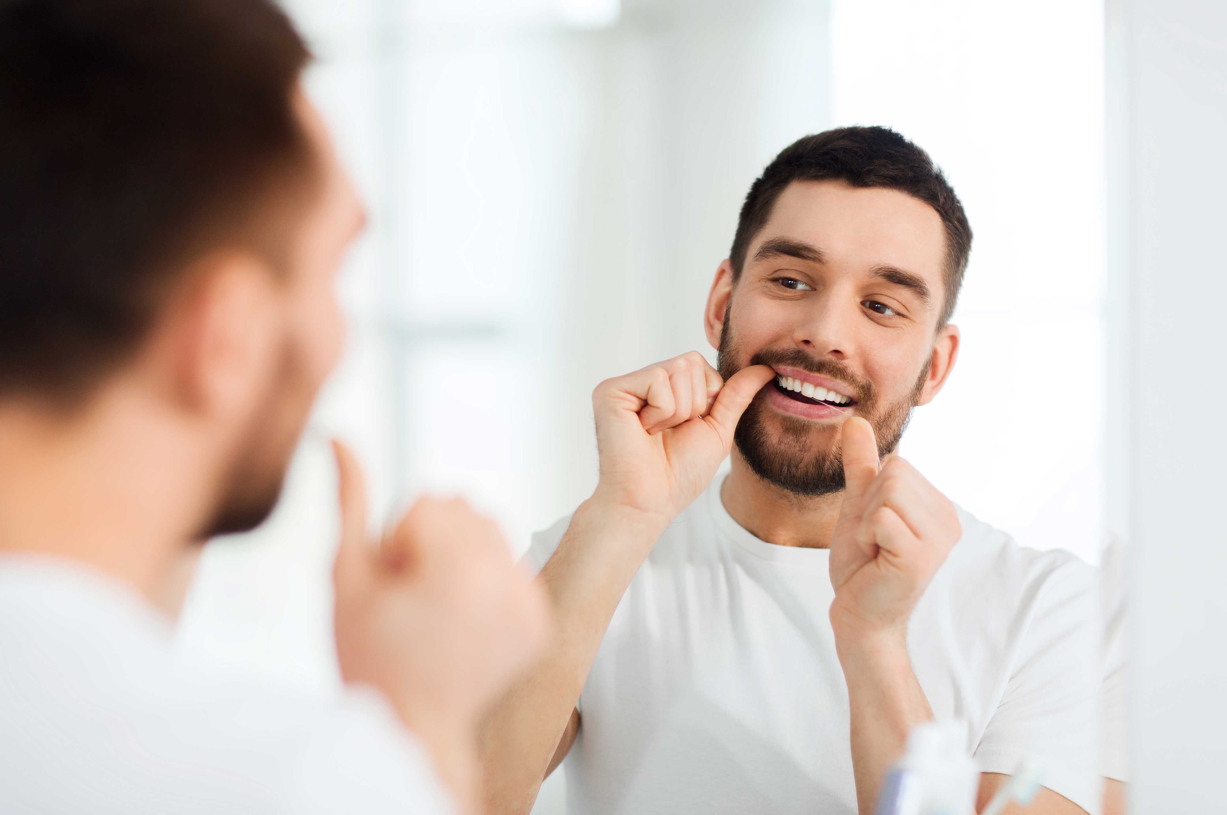 man-flossing-his-teeth.jpg