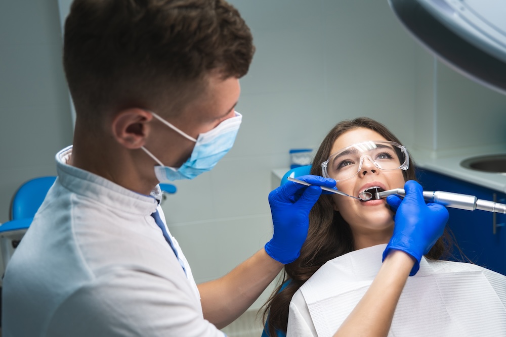 Woman in dentist’s office getting a dental procedure