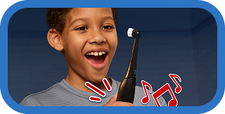 Kid holding electric toothbrush with music notes