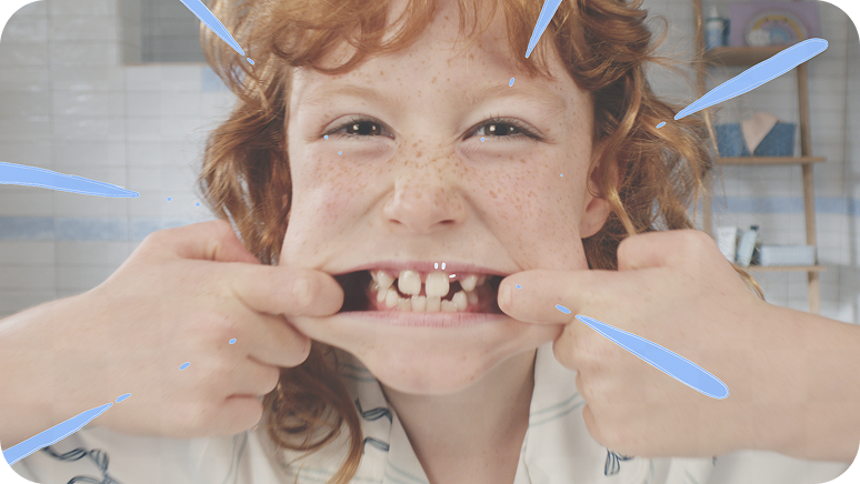 Redheaded girl smiling wide