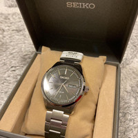 Seiko V158-0AM0 Day Date Stainless Steel Silver Black Solar Mens