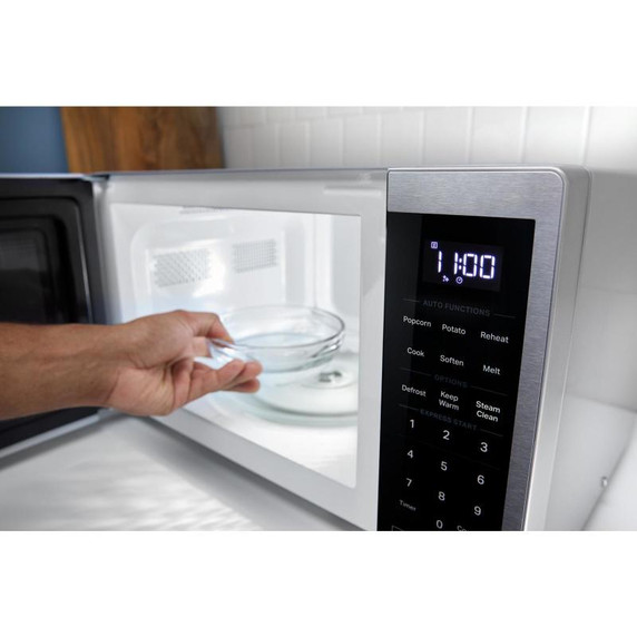Whirlpool® Four à micro-ondes de comptoir avec nettoyage à la vapeur de 900 watts - 0.9 pi cu WMCS3019RS