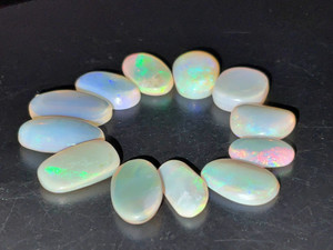 Australian Coober Pedy Opal 12 Pc 27.05 Carat