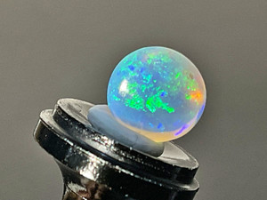 Rainbow Colorplay  Australian Coober Pedy Opal  0.95 Carat