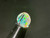Rainbow Colorplay Australian Coober Pedy White Opal 0.65 Carat