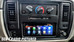 Aftermarket 1.5-DIN touchscreen radio installed in the factory dash of a 1994–1996 Chevy Impala SS, shown below the climate controls and between the factory air vents, with the radio interface displayed on screen.