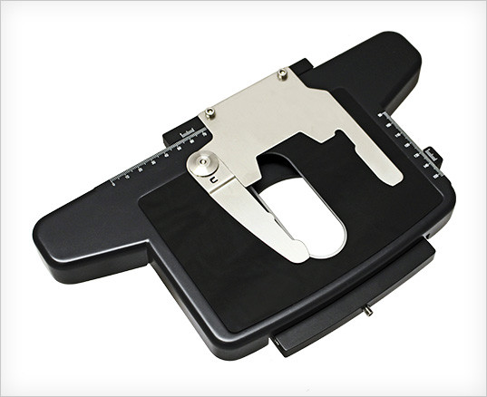 ACCU-SCOPE EXC-500 Series Mechanical Stage With Gorilla Glass. Our revolutionary, rackless mechanical stage with a GorillaTM glass stage insert allows operators to clearly and easily see their stained specimens while moving the slide effortlessly on the stage.