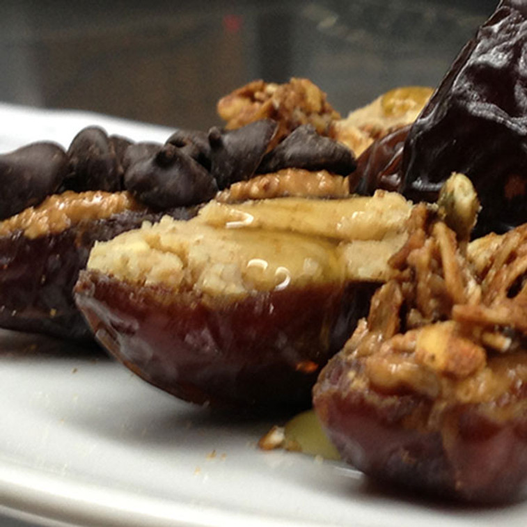 WALNUT BUTTER FILLED MEDJOOL DATES DRIZZLED WITH HONEY