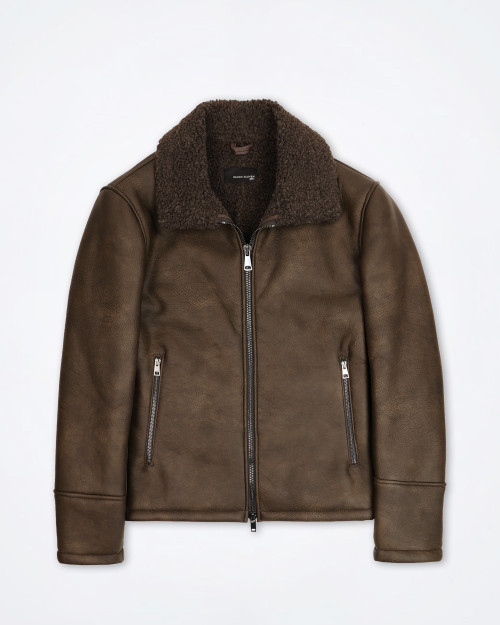 Block 11 brown aviator jacket displayed flat showing two‑way zip and fleece lining.