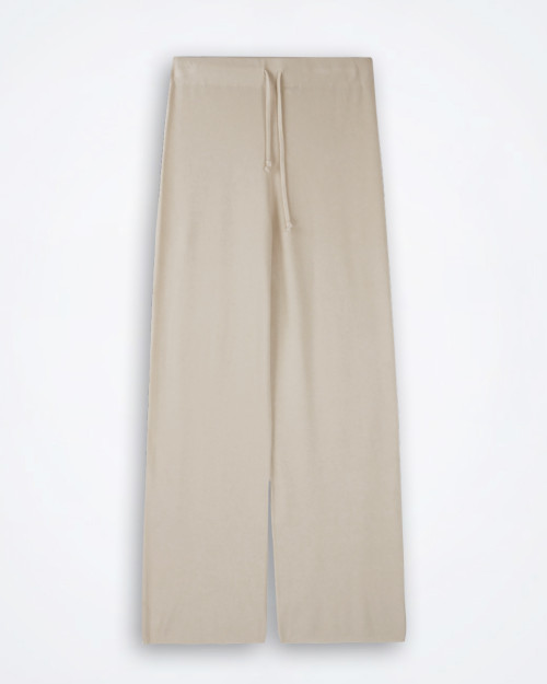 Beige loose‑fit pants by Maryley laid flat against a white background, showing straight‑leg cut, elastic waistband, and drawstring ties.