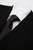 Close-up of Manuel Ritz black virgin wool suit fabric – fine texture and craftsmanship