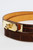 Detail shot showing croc‑embossed brown leather and gold metal buckle.