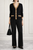 Sandro Ferrone women’s black cardigan shown on model to display fit, length, and sleeve shape.