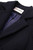 Close‑up of the Sandro Ferrone navy blue coat collar, showing the clean lapel shape and textured fabric.