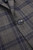 Close‑up of fabric texture on Exibit checked blazer