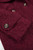 Detailed shot of the bouclé fabric revealing its soft, looped texture and rich surface depth.