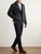 Model wearing the Simon Peet dark grey wool‑blend peacoat styled with trousers, demonstrating fit and length.