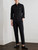 Model wearing the Just Cavalli black slim‑fit shirt paired with trousers, demonstrating the fit and overall silhouette.