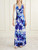 Model wearing Imperial sleeveless blue maxi dress, showing fit and movement.