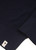 Close‑up of knit texture and branding detail on the cardigan.