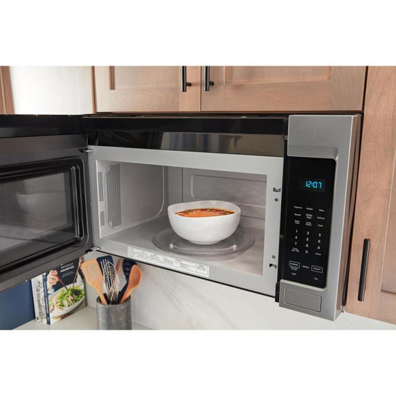Maytag® Four à micro-ondes à hotte intégrée avec revêtement intérieur antiadhésif - 1.7 pi cu YMMMS4230PZ