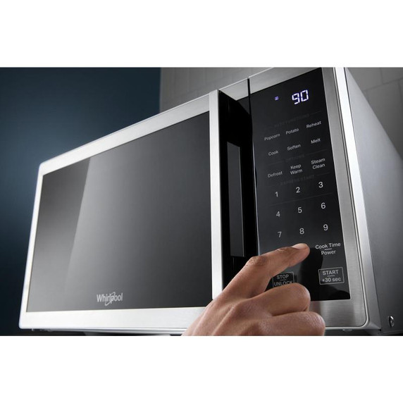 Whirlpool® Four à micro-ondes de comptoir avec nettoyage à la vapeur de 900 watts - 0.9 pi cu WMCS3019RS