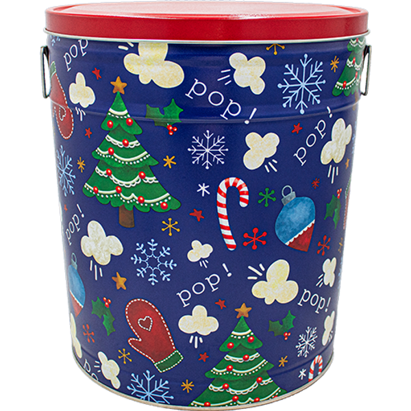 Pop Pop Pop! Grand Popcorn Tin – 6.5 Gallon — blue holiday tin with trees, mittens, candy canes, and snowflakes.