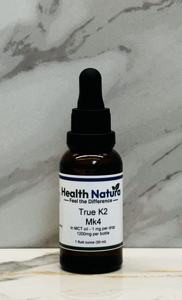 True K2 Mk4 1 oz supplement bottle by Health Naturals with marble background.