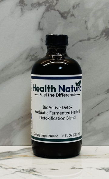 BioActive Detox bottle, 8 FL OZ, herbal liquid supplement, brand Health Natura, on marble.