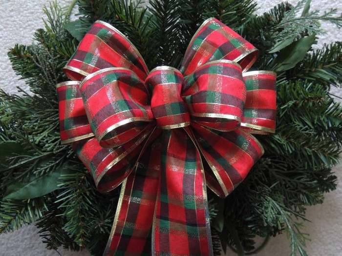 Holiday bows are a nice addition to any Christmas wreath for your door.