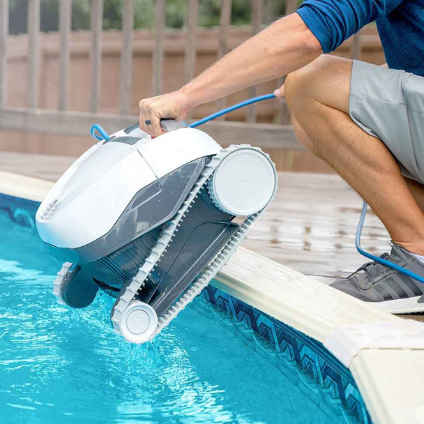 Maytronics Dolphin E10 Robotic Pool Cleaner Being Removed From a Swimming Pool