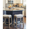 Counter Height Saddle Style Counter Stool with Cream Fabric and Nail head Trim