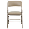 2 Pack HERCULES Series Curved Triple Braced & Double Hinged Beige Vinyl Metal Folding Chair