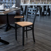 HERCULES Series Black Ladder Back Metal Restaurant Chair - Natural Wood Seat