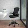 Kelista Mid-Back Black Mesh Ergonomic Drafting Chair with Adjustable Foot Ring and Flip-Up Arms