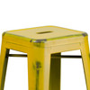 Kai Commercial Grade 30" High Backless Distressed Yellow Metal Indoor-Outdoor Barstool