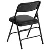 HERCULES Series Curved Triple Braced & Double Hinged Black Vinyl Metal Folding Chair