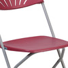 HERCULES Series 650 lb. Capacity Burgundy Plastic Fan Back Folding Chair