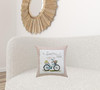 17" X 17" Light Pink Checkered Easter Bunny on Bicycle Throw Pillow