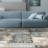 7' X 9' Teal Gray And Tan Floral Power Loom Distressed Stain Resistant Area Rug