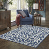 5' X 8' Navy Geometric Stain Resistant Indoor Outdoor Area Rug