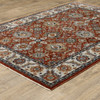 10' X 13' Red Blue Ivory Gold And Navy Oriental Power Loom Stain Resistant Area Rug With Fringe