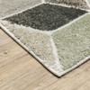 5' X 8' Beige Brown Grey Tan Sage And Pale Blue Geometric Power Loom Stain Resistant Area Rug