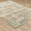 5' X 7' Beige Grey Blues Orange Yellow And Ivory Abstract Power Loom Stain Resistant Area Rug