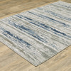 5' X 8' Blue Ivory Grey Light Blue And Brown Abstract Power Loom Stain Resistant Area Rug