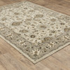 6' X 9' Beige Grey Brown And Charcoal Oriental Power Loom Stain Resistant Area Rug