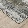 5' X 8' Ivory Charcoal Grey Blue Rust And Brown Abstract Power Loom Stain Resistant Area Rug