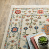10' X 13' Ivory Salmon Pink Gold Blues Grey Rust And Green Oriental Power Loom Stain Resistant Area Rug With Fringe